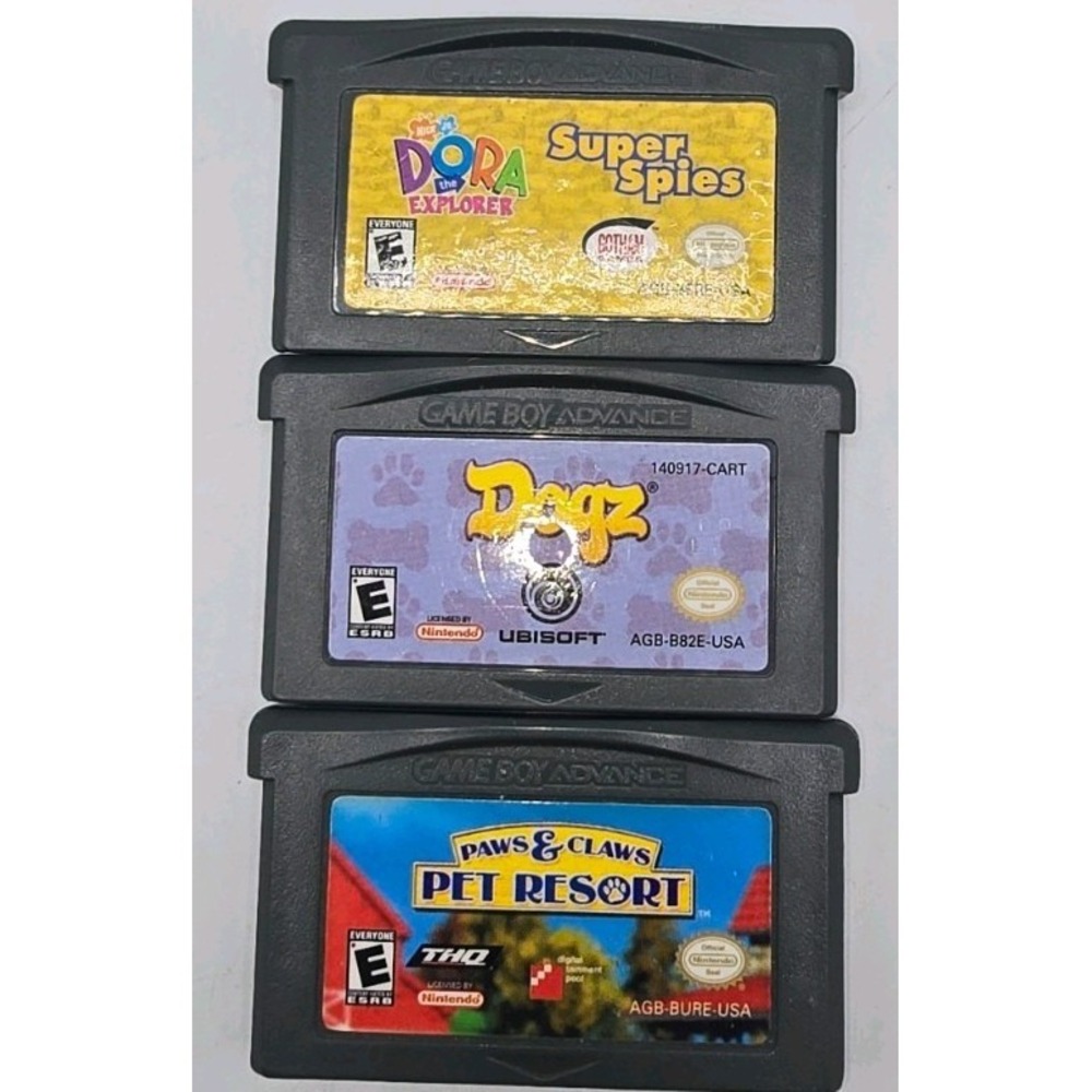 Gameboy Advance Dora Super Spies, Dogz, Paws & Claws‎ Resort games.